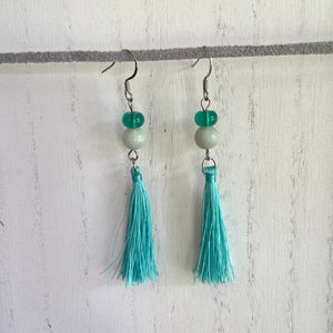 Handcrafted earrings on stainless steel earring wires. Stainless steel components. Amazonite stones and glass beads.  Nylon tassels.