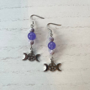 Handcrafted on stainless steel earring wires and components.
Stainless steel charms.
Natural purple turquoise stones and purple quartzite.