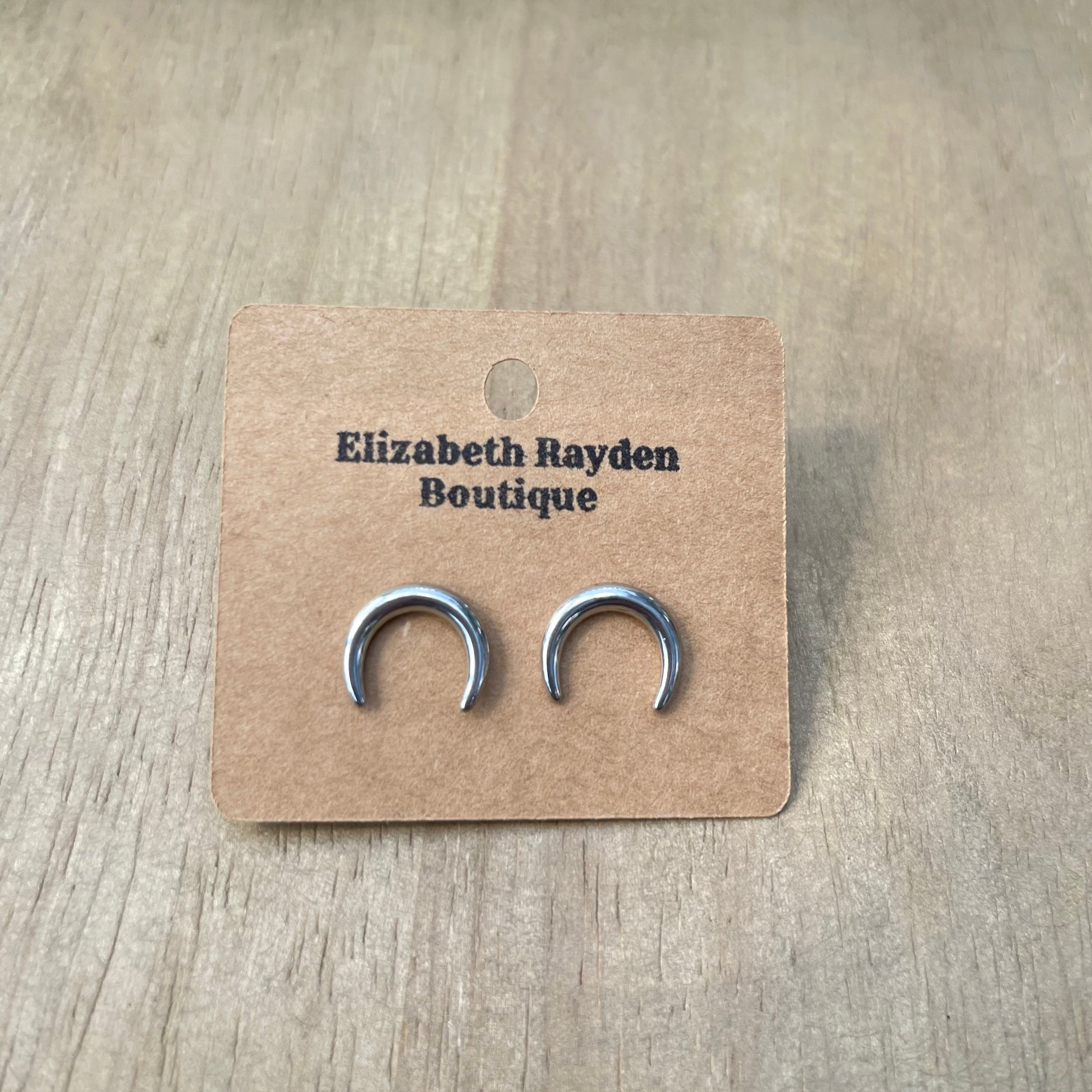 Crescent moon stud earrings in stainless steel. 14mm x 12.5mm.