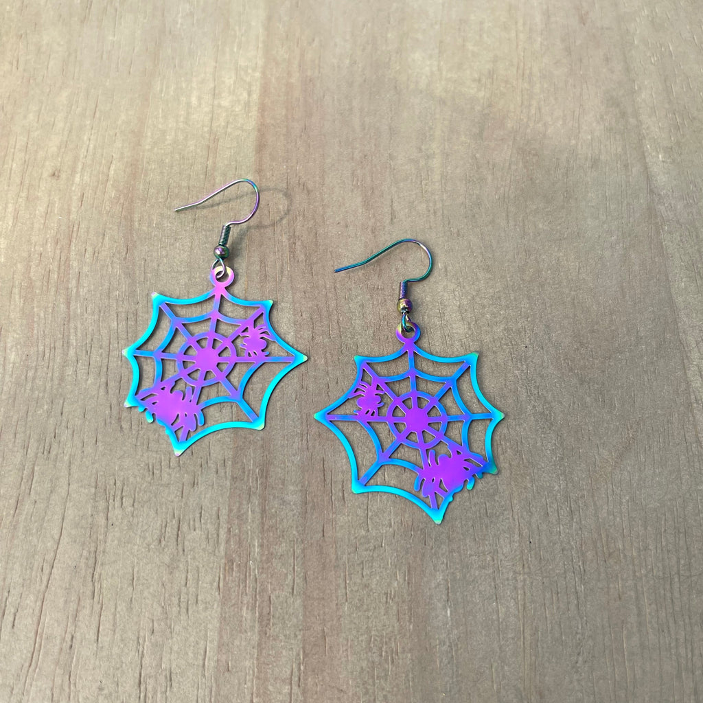 Handcrafted earrings with stainless steel wires. Electroplated stainless steel charms. Charms size: 37.5mm x 33.5mm.