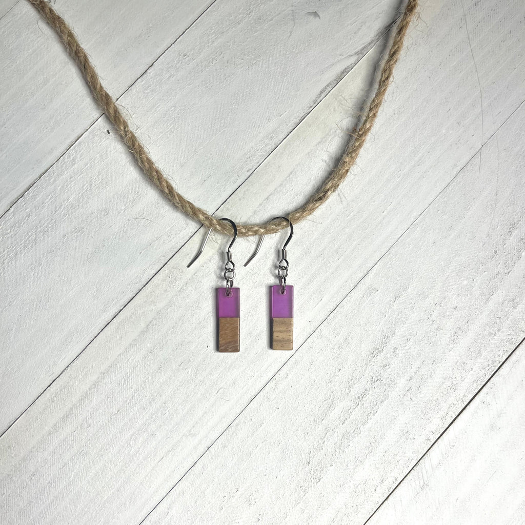 Handcrafted earrings with stainless steel earring wire and components. Purple resin and wood rectangle charms