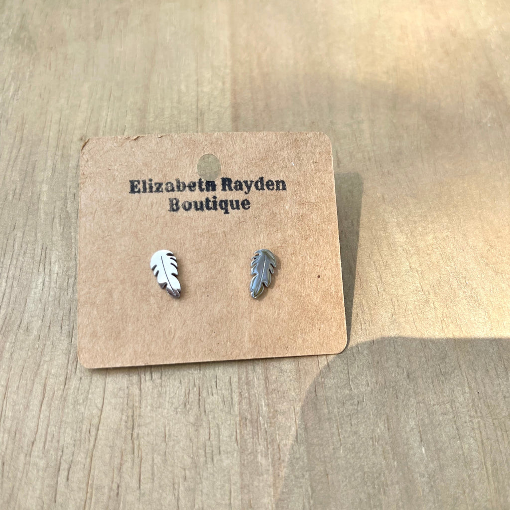 Small feather stud earrings in  stainless steel. Measurements: 11mm x 5mm. Lead free and nickel safe.