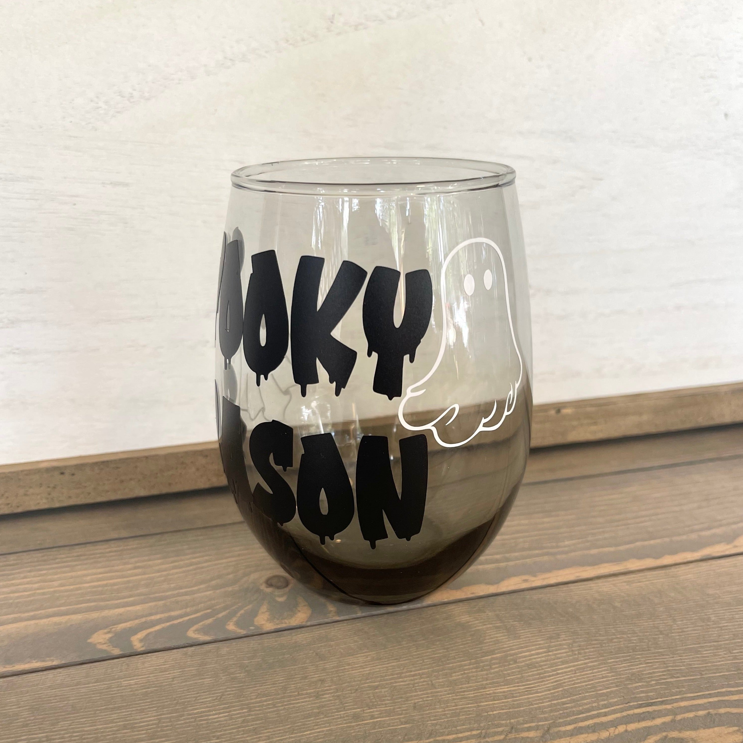 Glass stemless wine glass adorned with witty saying in permanent vinyl. Holds 20 ounces of liquid. Care instructions: Hand wash only, not dishwasher safe, do not microwave, and do not soak. 