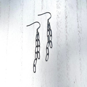 Handcrafted earrings with stainless steel wires and components. 