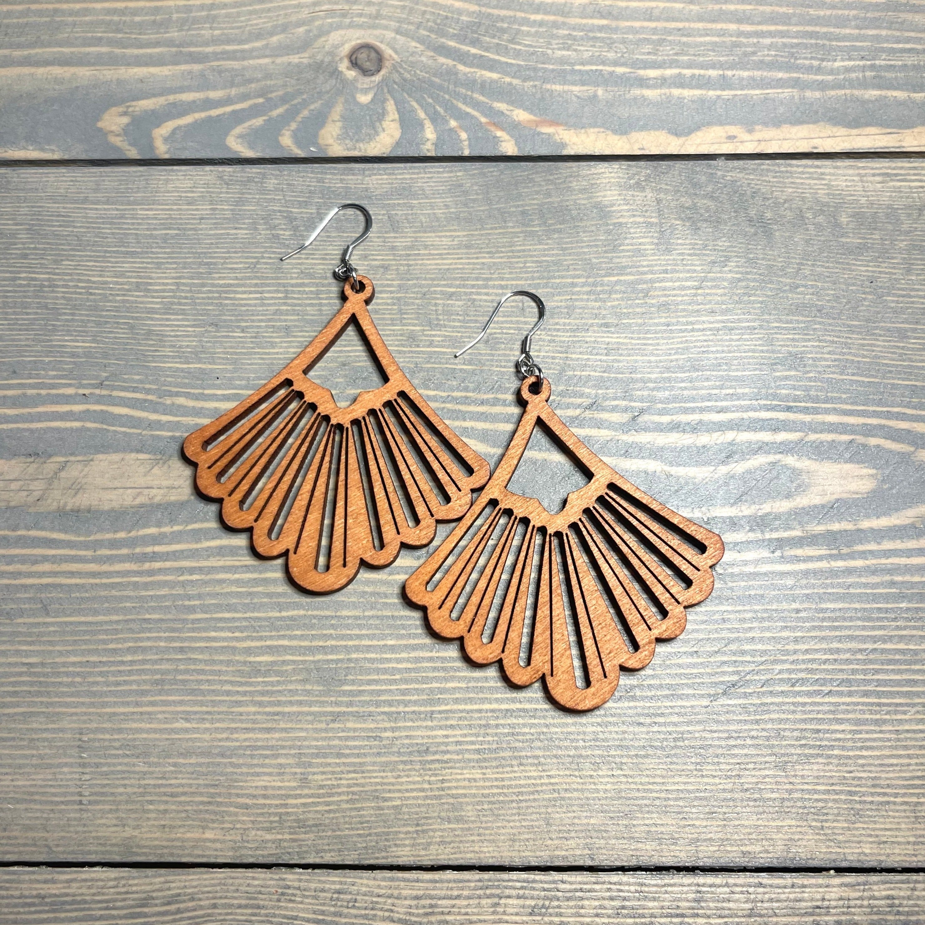 Handcrafted earrings with stainless steel earring wires and components. Natural wood pendants.