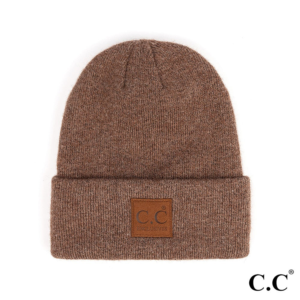 C.C Heather knit beanie hat with suede patch. One size fits most. 97% Recycled polyester / 3% spandex.