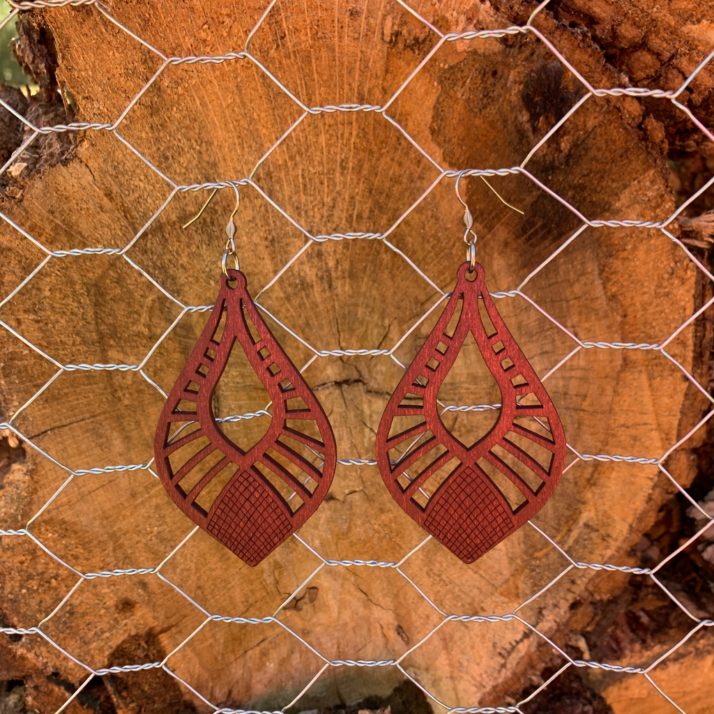 Hand crafted earrings with surgical stainless steel earring wires. Laser cut Aspen wood pointed teardrop pendants.