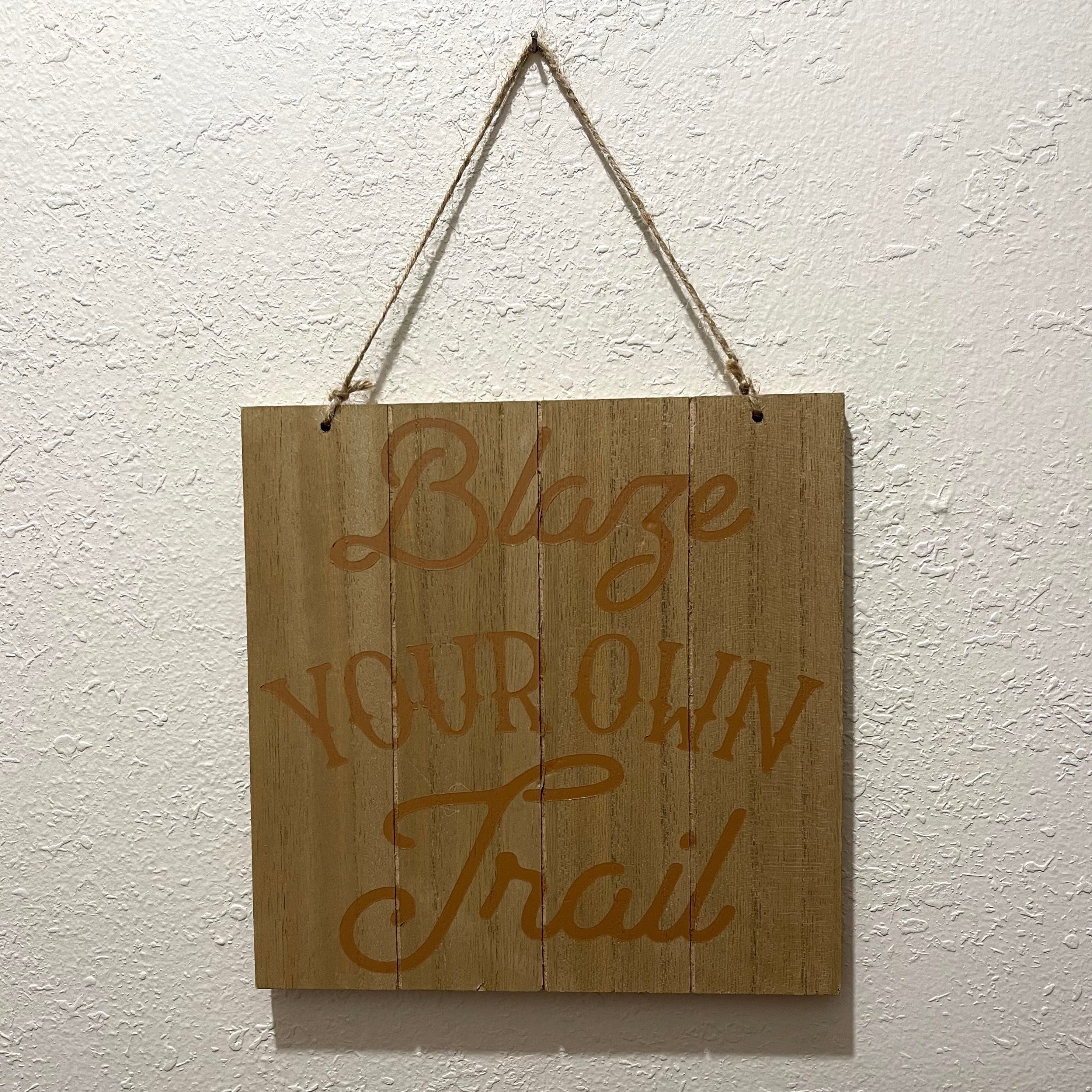 Wooden sign with painted saying. Hang on wall with twine. Approximately 8 1/2 inches tall and 8 1/2 inches wide. 