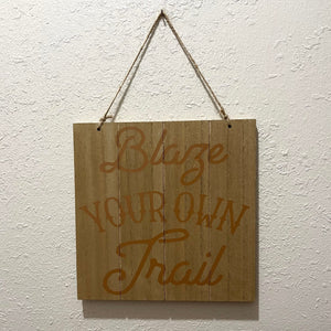 Wooden sign with painted saying. Hang on wall with twine. Approximately 8 1/2 inches tall and 8 1/2 inches wide. 