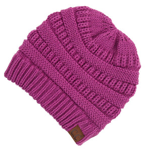 Ribbed Knit Beanie Featuring Criss-Cross Ponytail Detail. Multiple Ways to Wear. One size fits most. 100% Acrylic. Care: Hand Wash, Cold; Do Not Tumble Dry; Do Not Iron; Do Not Bleach; Dry Clean, Any Solvent Except Trichloroethylene.