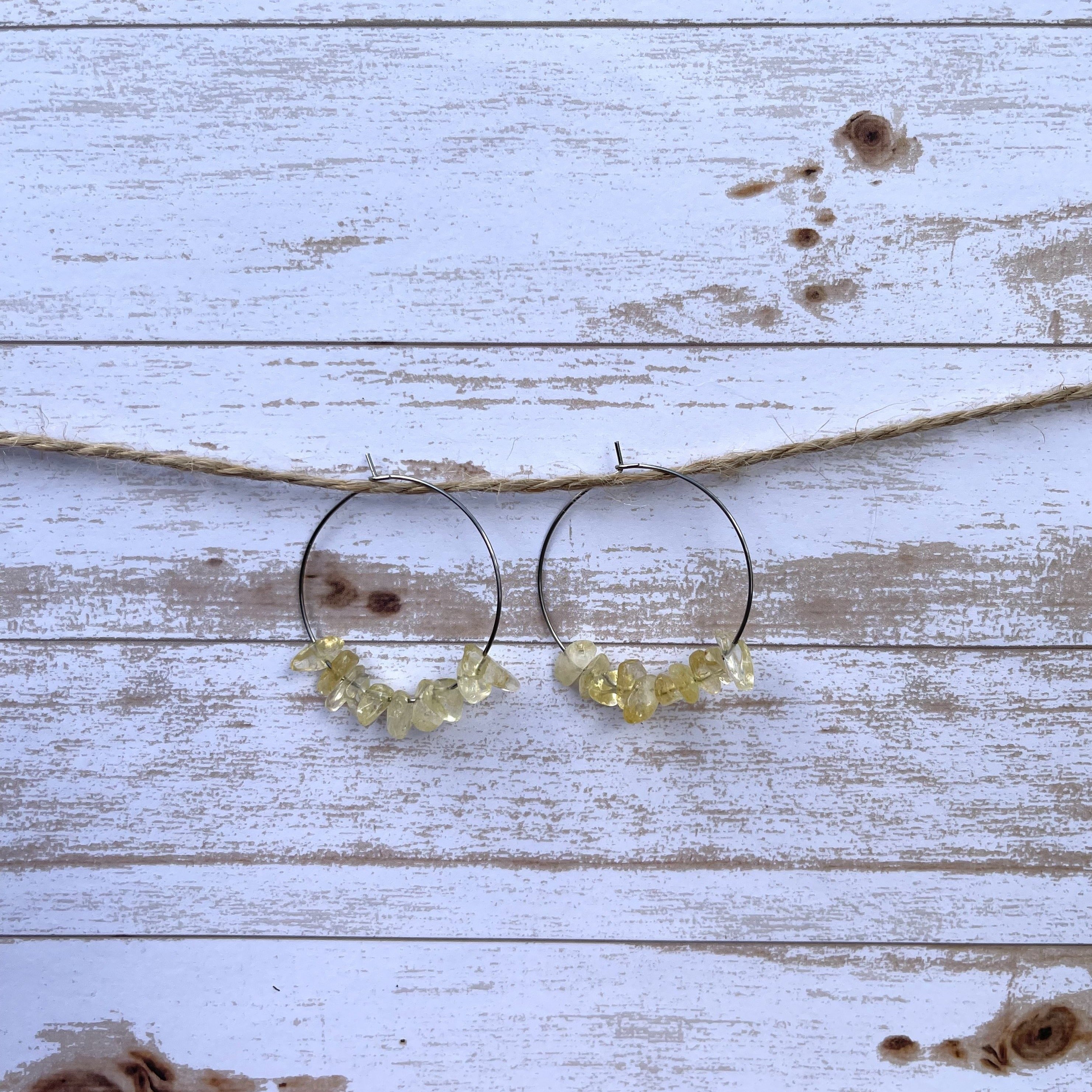 Handcrafted on 35mm stainless steel hoop earrings. Citrine stones.