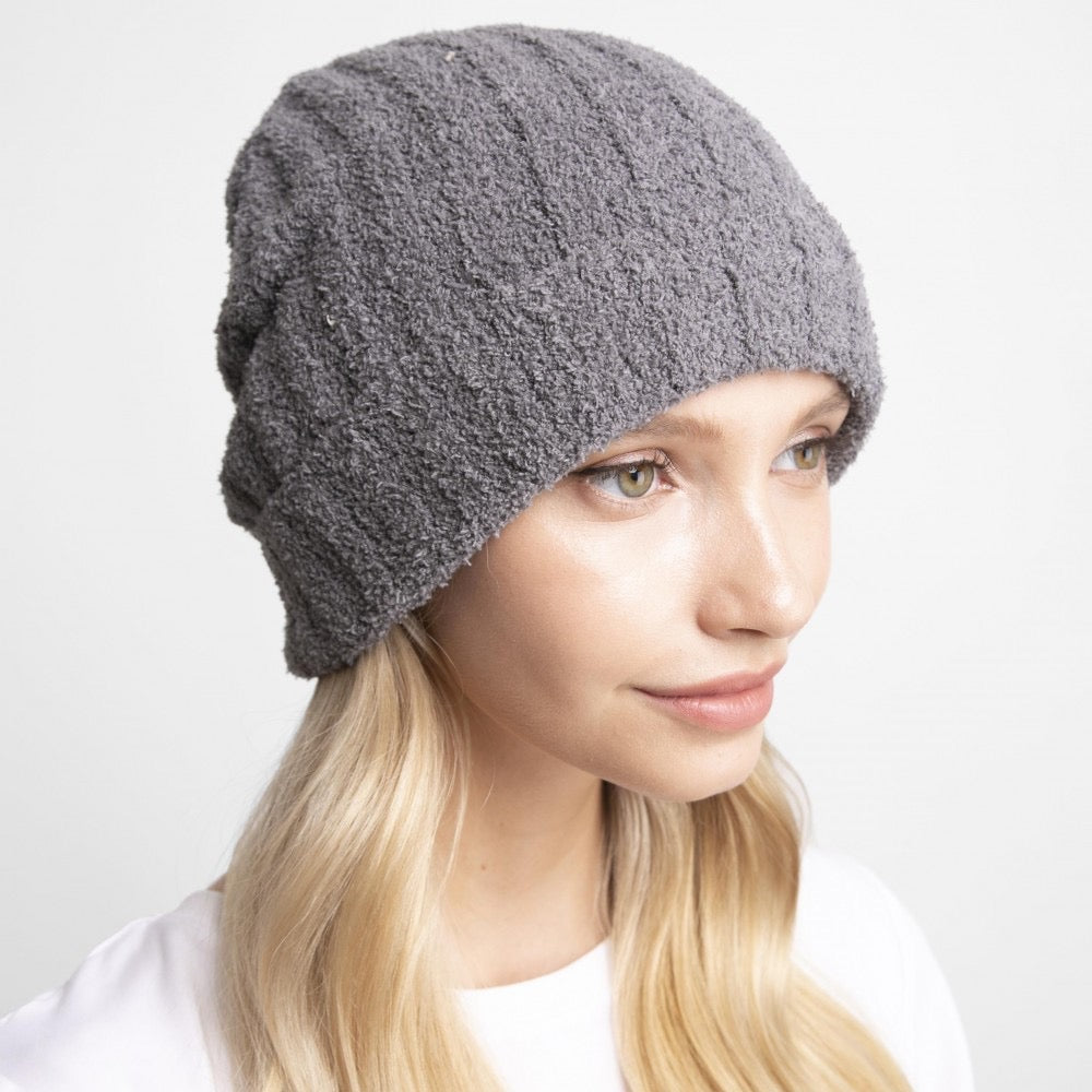 Solid Print Comfy Luxe Beanie. One Size Fits Most. 100% Polyester Microfiber. Cuffed. Wrinkle-Resistant. Care: Machine Washable. Lay Flat to Dry or Tumble Dry Low. Steam or Cool Iron if Necessary. 