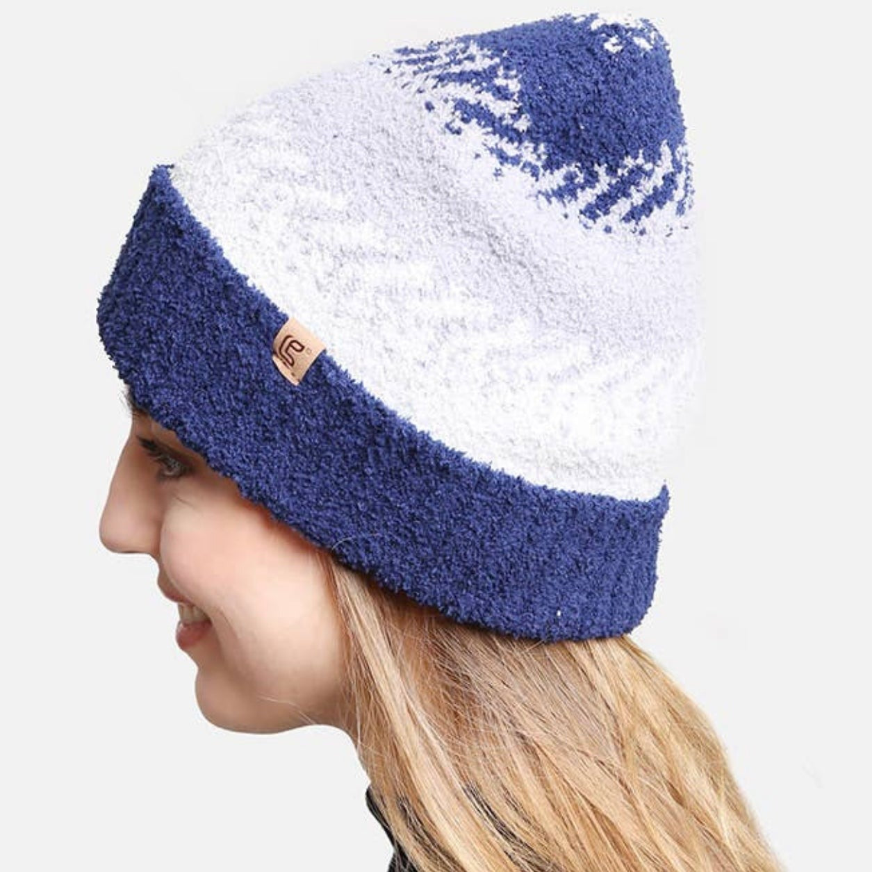 Comfy luxe mixed knit beanie shaded of blue. 100% microfiber polyester. 4 way stretch. Warm feel, soft touch. Wrinkle-resistant.