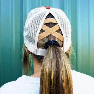 Cross Ponytail Cap 65% Cotton, 35% Polyester Beige Mesh Back Slot with Criss-Crossing Elastic Bands in Back for High Ponytail or Bun 7 Panel - 2 Solid, 4 Mesh, and 1 with Straps and Closure Adjustable Velcro Closure One Size Fits Most