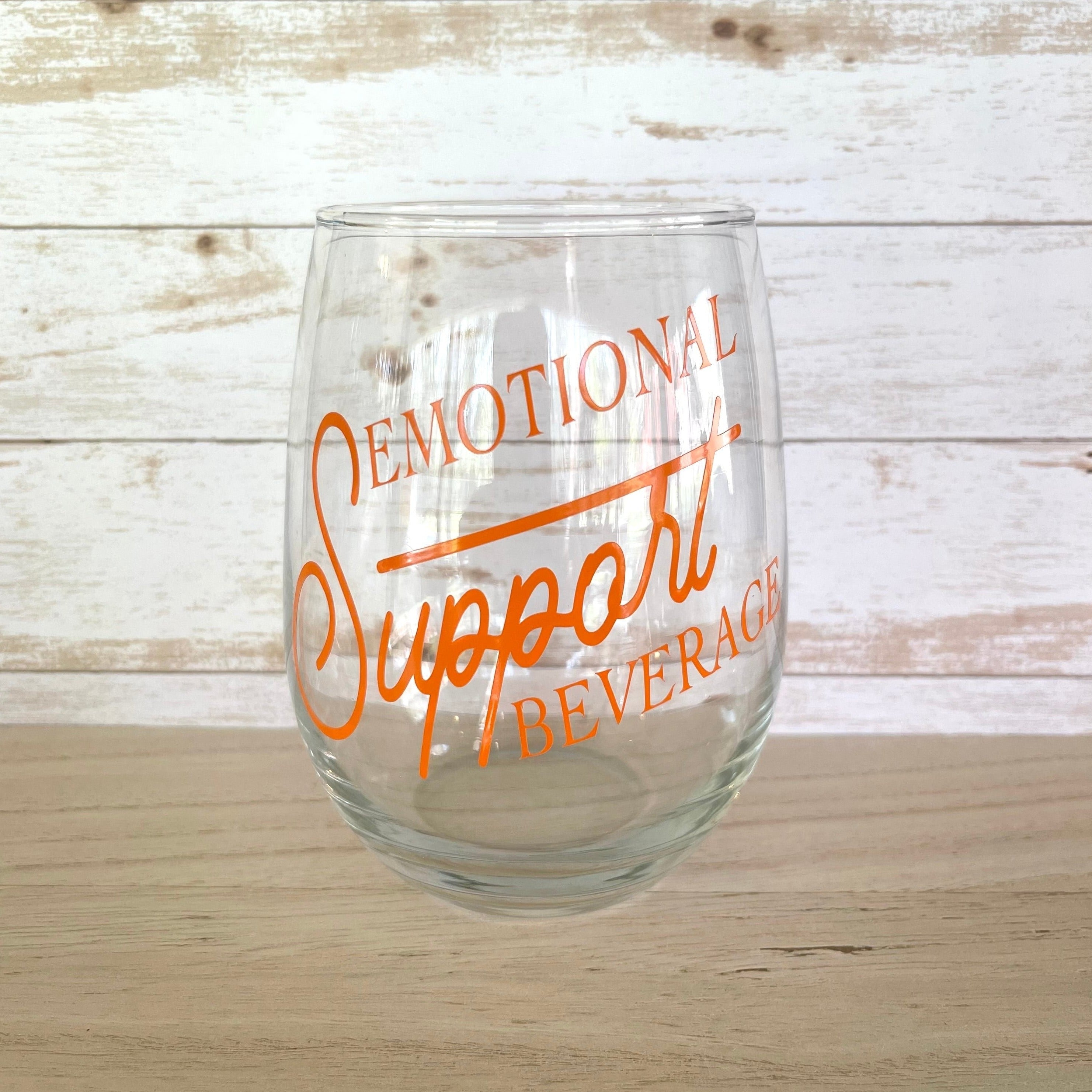 Glass stemless wine glass adorned with witty saying in permanent vinyl.  Holds 20 ounces of liquid. Care instructions: Hand wash only, not dishwasher safe, do not microwave, do not soak.