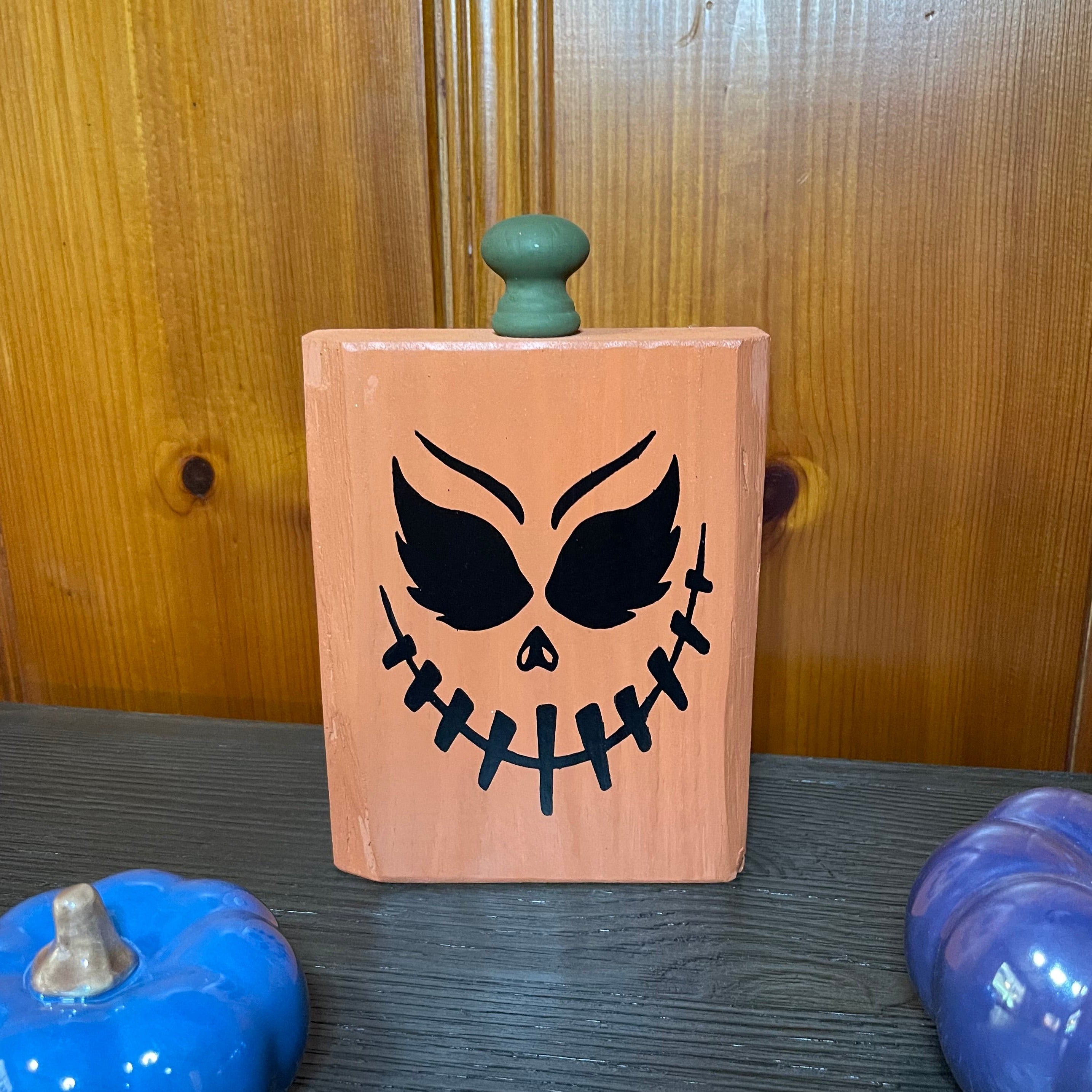 Eyebrows Face - Wooden Pumpkin Decor Handcrafted wooden pumpkin. Stands 8 1/2 inches tall.  Width: 5 3/8 inches. Depth 1.5 inches.