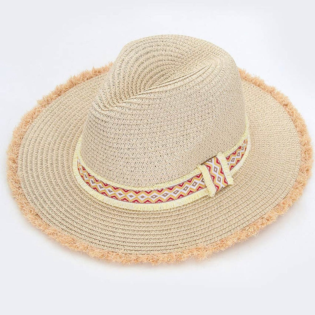 Frayed trim straw hat. Aztec frayed band. 100% paper. One size fits most. Adjustable. 