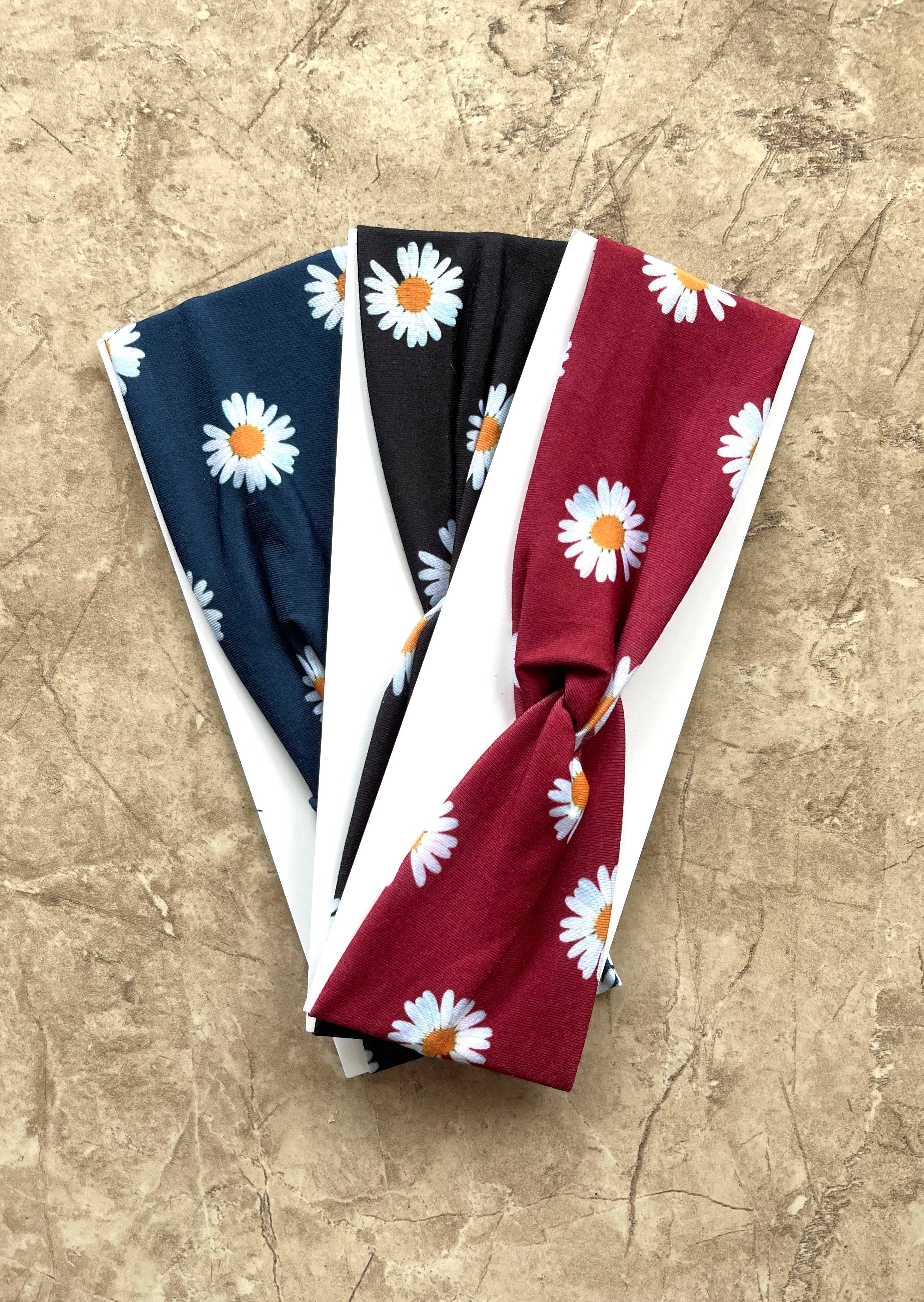 Turban twisted floral daisy head wrap. One size fits most. Available in 3 colors.