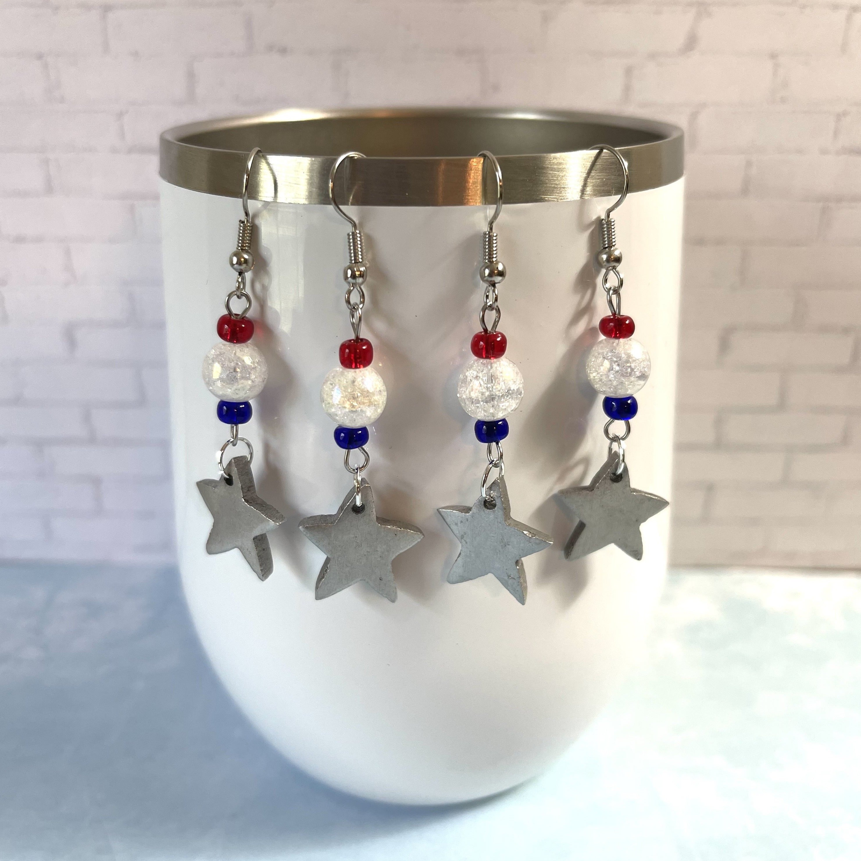 Handcrafted earrings with quartz and glass seed beads to accent. Earrings are made with a mix of silver metals including stainless steel, pewter, aluminum, and imitation rhodium earring wires.