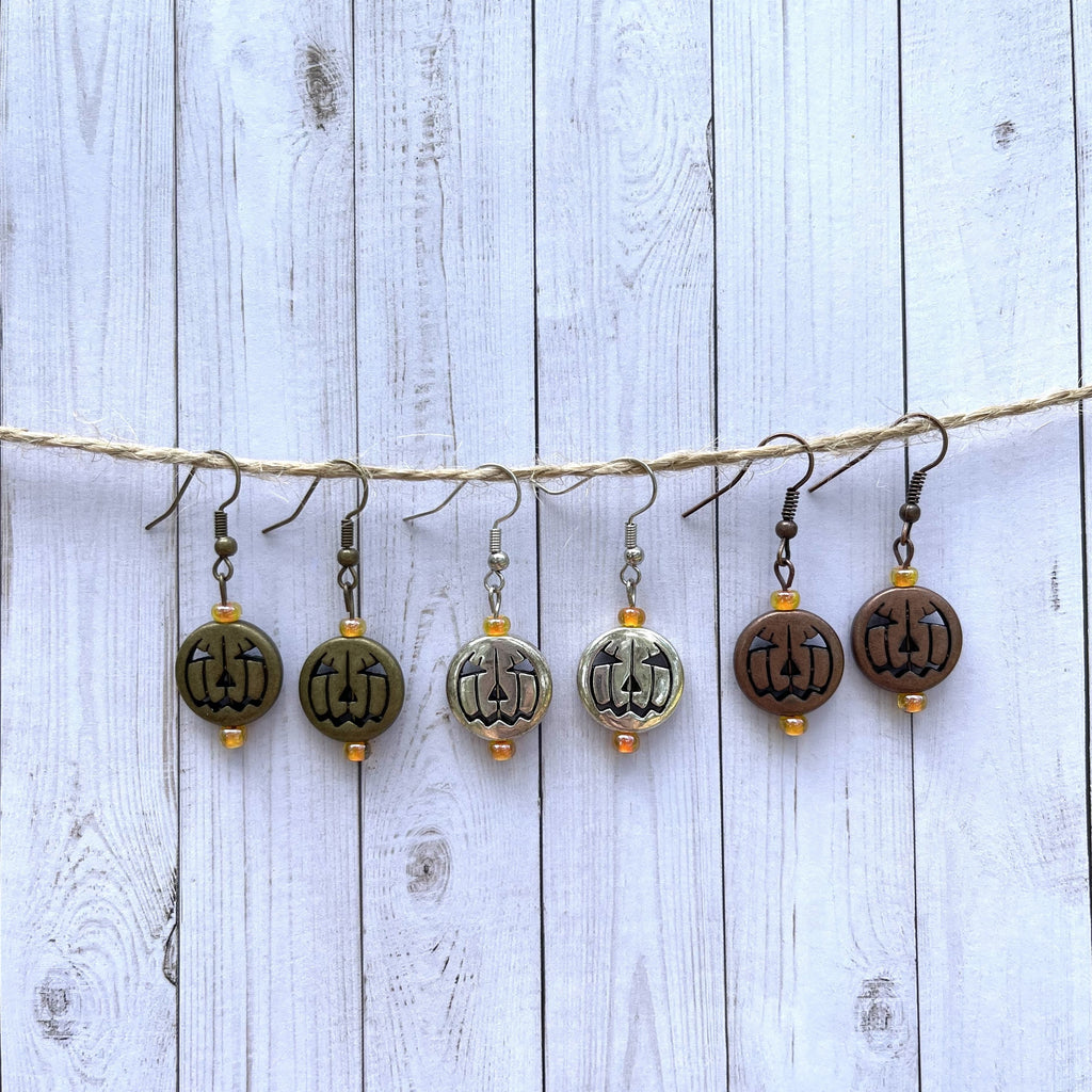 Handcrafted earrings with Czech glass accent seed beads. Comes in three different colors: brass, silver plated, and antique copper.