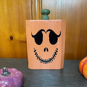 Lashes Face - Wooden Pumpkin Decor Handcrafted wooden pumpkin. Stands 8 1/2 inches tall.  Width: 5 3/8 inches. Depth 1.5 inches.