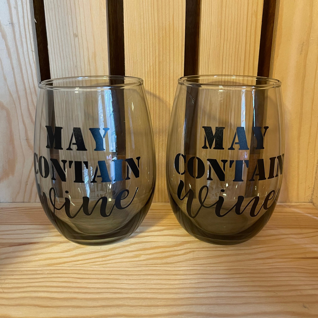 Smokey glass stemless wine glass adorned with witty saying in permanent vinyl.  Holds 20 ounces of liquid. Care instructions: Hand wash only, not dishwasher safe, do not microwave, do not soak.