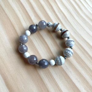 Handcrafted stretch bracelet on professional Ninja Stretch Cord. Beaded with cloudy quartz, agate, howlite, and stainless steel.