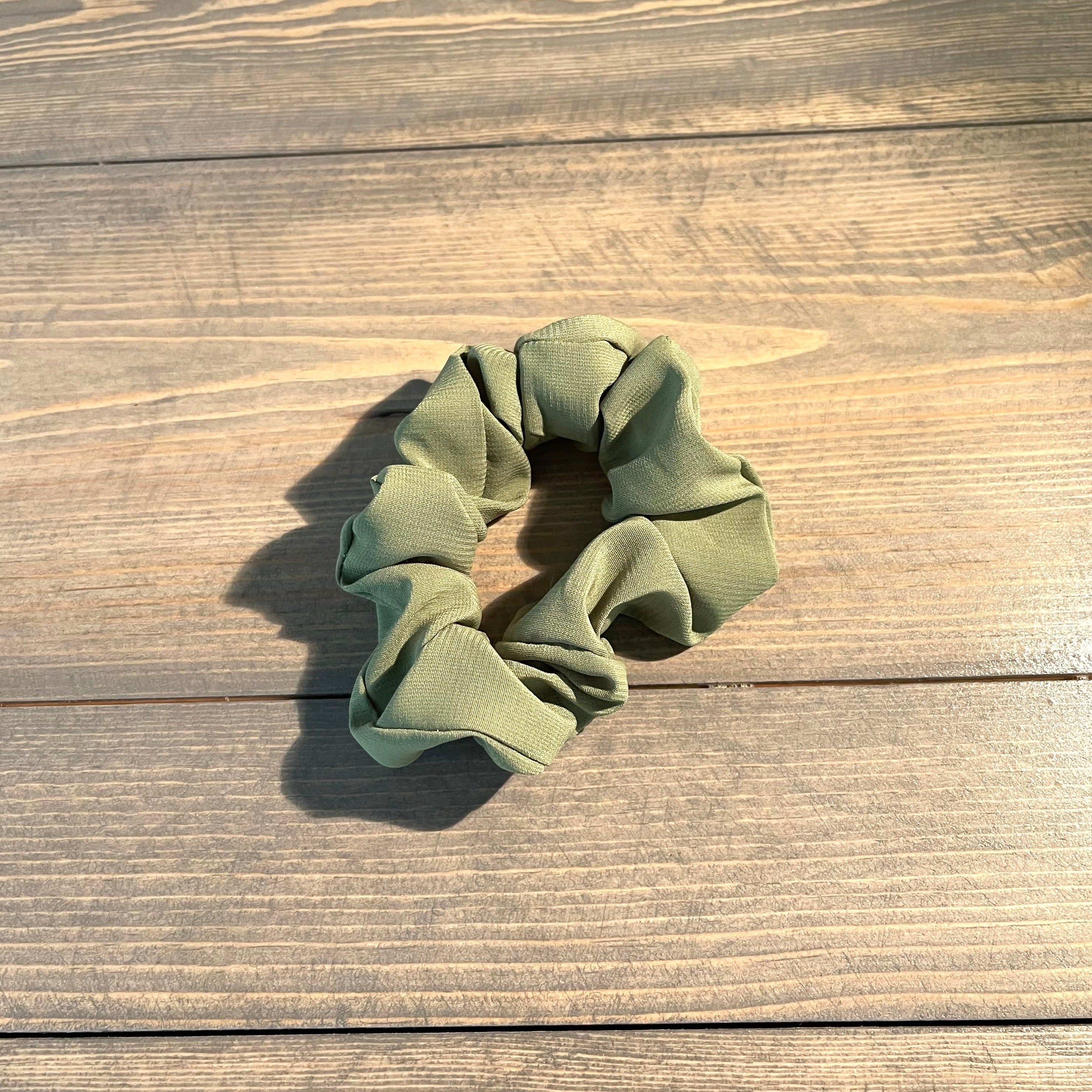 Classic scrunchie design in olive green.