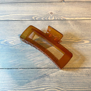 Jumbo size solid long rectangle hair clip. Size: Approx. 5 inch X 2.2 inch 100% acrylic.