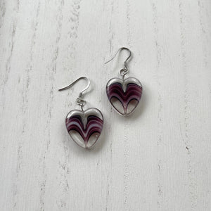 Purple and clear glass heart beads.  Stainless steel earring wires and components.