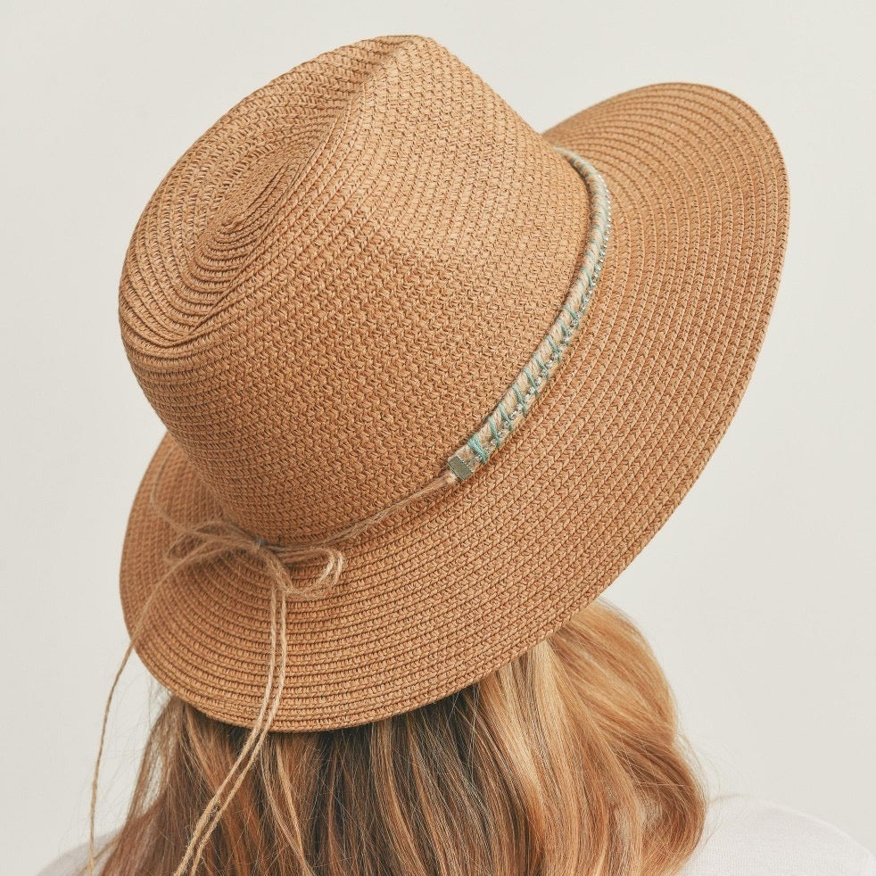 Sun hat with tied band featuring rhinestone accents. One size fits most. Drawstring adjustable. Brim approximately 3.5". 100% paper.