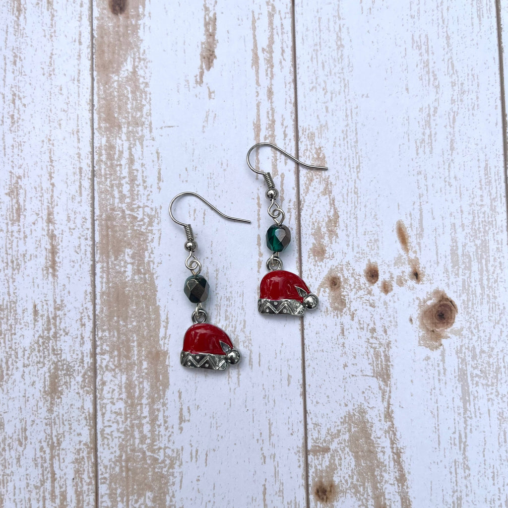 Handcrafted on silver plated earring wires. Pewter Christmas charms with enamel. Czech glass fire polished beads.