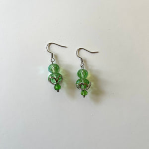 Handcrafted earrings with stainless steel earring wires and components. All glass beads.