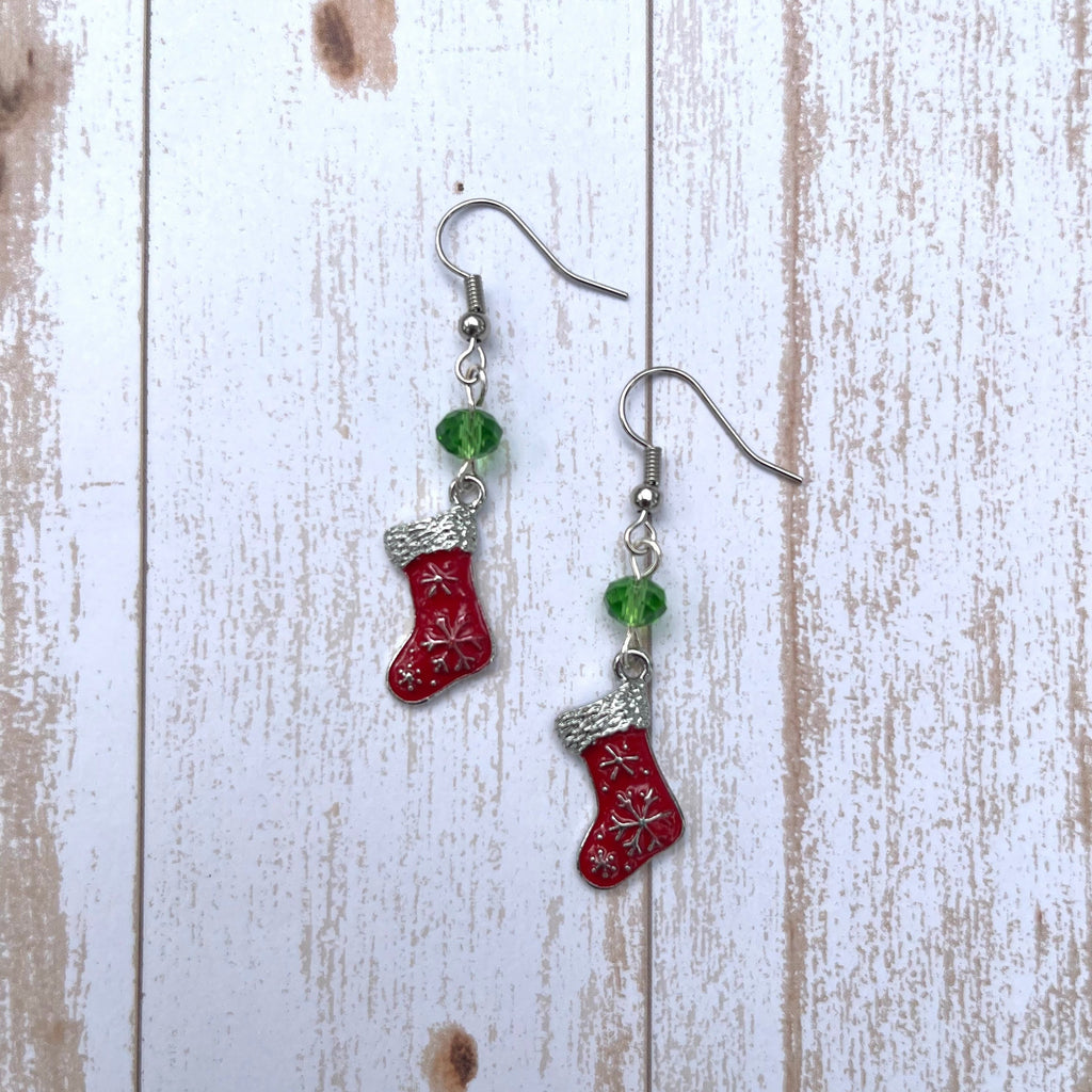 Handcrafted on silver plated earring wires. Pewter Christmas charms with enamel. Glass beads.