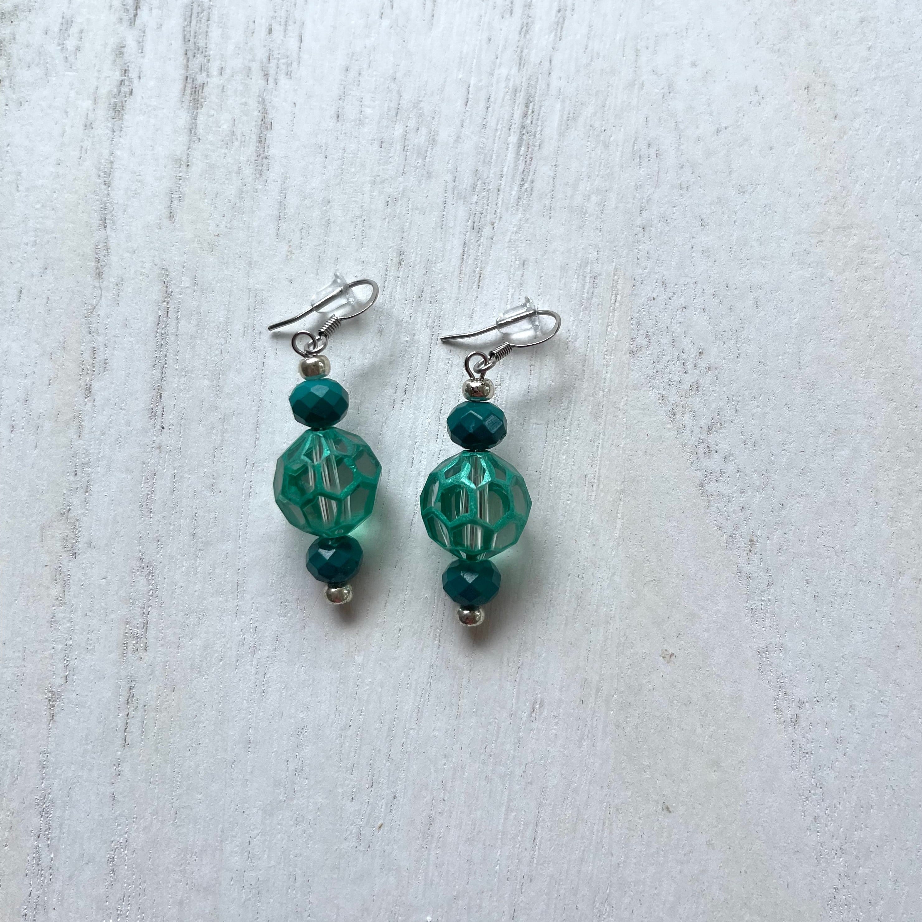 Handcrafted earrings with stainless steel earring wires and components.  Glass beads.