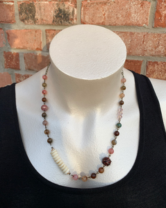 Handcrafted with all brass metal. Beaded with mixed color agate beads, round glass accents beads, pink glass bi-cone beads, and bone spacer rondels beads with amber glass bead caps.  Length is 24.25 inches. 