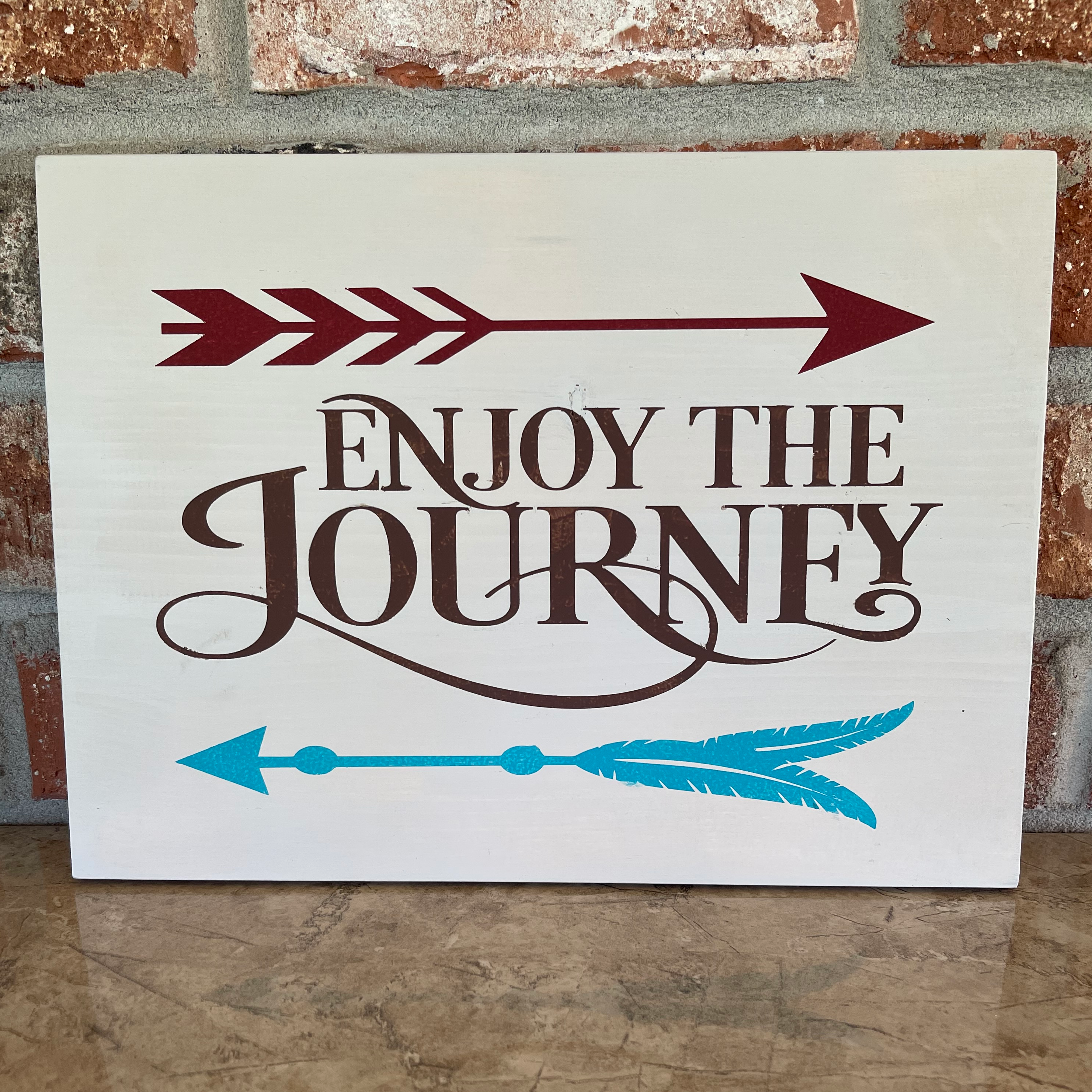 Handcrafted wooden sign that hangs on the wall. Measures 4 5/8" x 8 1/4".