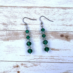 Handcrafted with all stainless steel. Earring wires are surgical stainless steel. Green and light blue faceted rondelle glass beads.