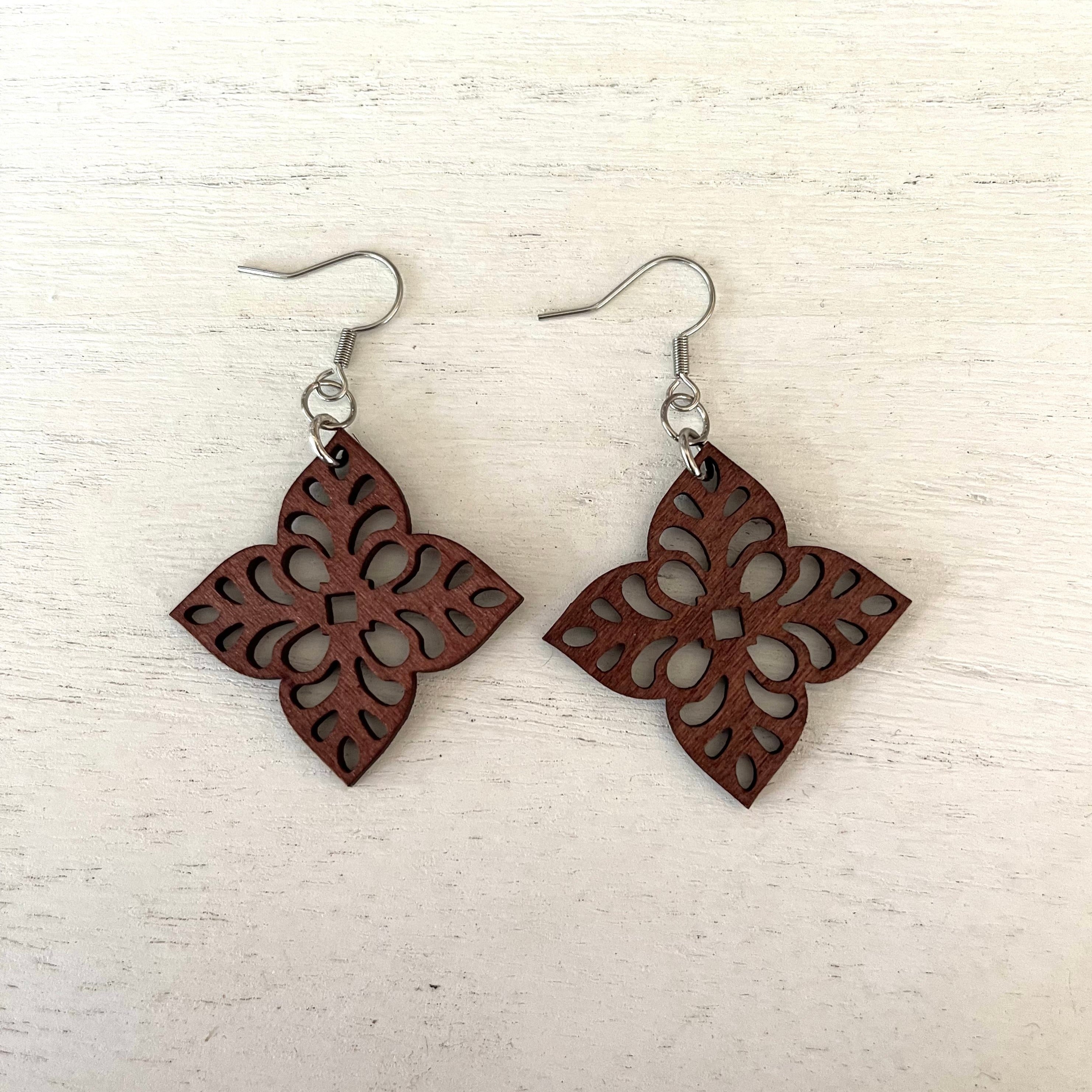 Handcrafted floral wood earrings. Floral wood pendants. Stainless steel earring wires and components.  Comes with earring backs. 