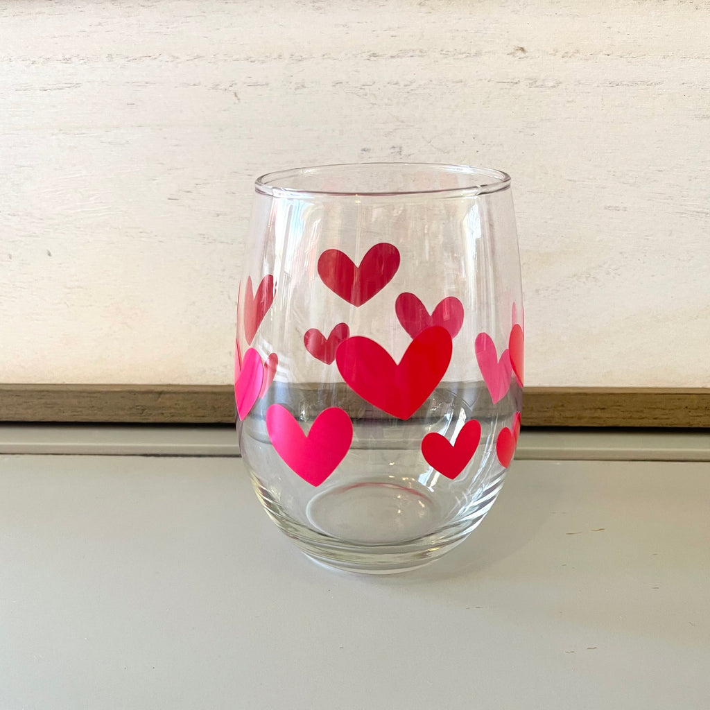 Glass stemless wine glass adorned with witty saying in permanent vinyl.  Holds 20 ounces of liquid. Care instructions: Hand wash only, not dishwasher safe, do not microwave, do not soak.