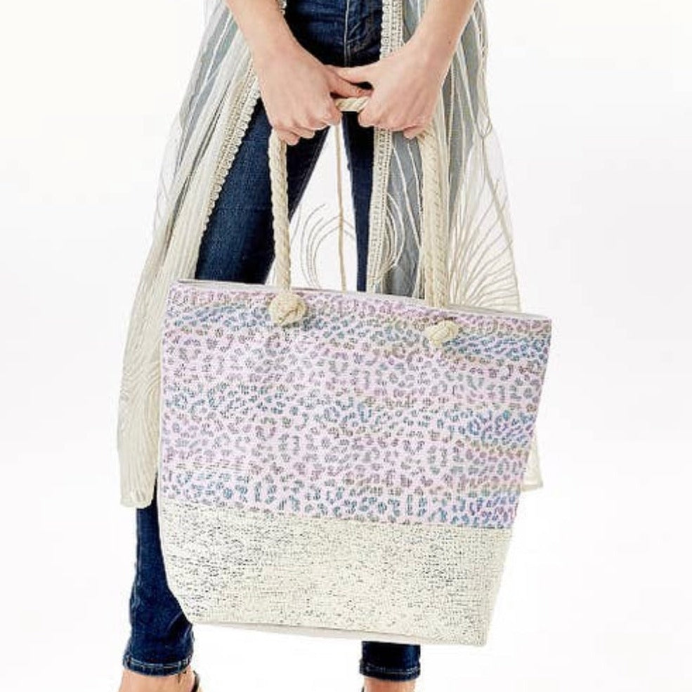 Iridescent leopard print beach tote bag. 70% cotton 30% PU. 18.8” x 15” x 5”