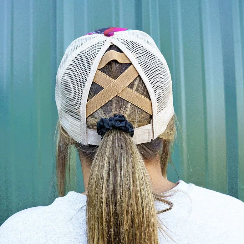 Serape Ponytail Cap. 65% Cotton, 35% Polyester. Beige Mesh Back. Slot with Criss-Crossing Elastic Bands in Back for High Ponytail or Bun. 7 Panel - 2 Solid, 4 Mesh, and 1 with Straps and Closure. Adjustable Velcro Closure. Pre-Curved Visor. Adjustable, One Size Fits Most.