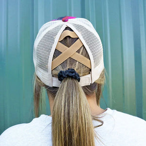 Serape Ponytail Cap. 65% Cotton, 35% Polyester. Beige Mesh Back. Slot with Criss-Crossing Elastic Bands in Back for High Ponytail or Bun. 7 Panel - 2 Solid, 4 Mesh, and 1 with Straps and Closure. Adjustable Velcro Closure. Pre-Curved Visor. Adjustable, One Size Fits Most.